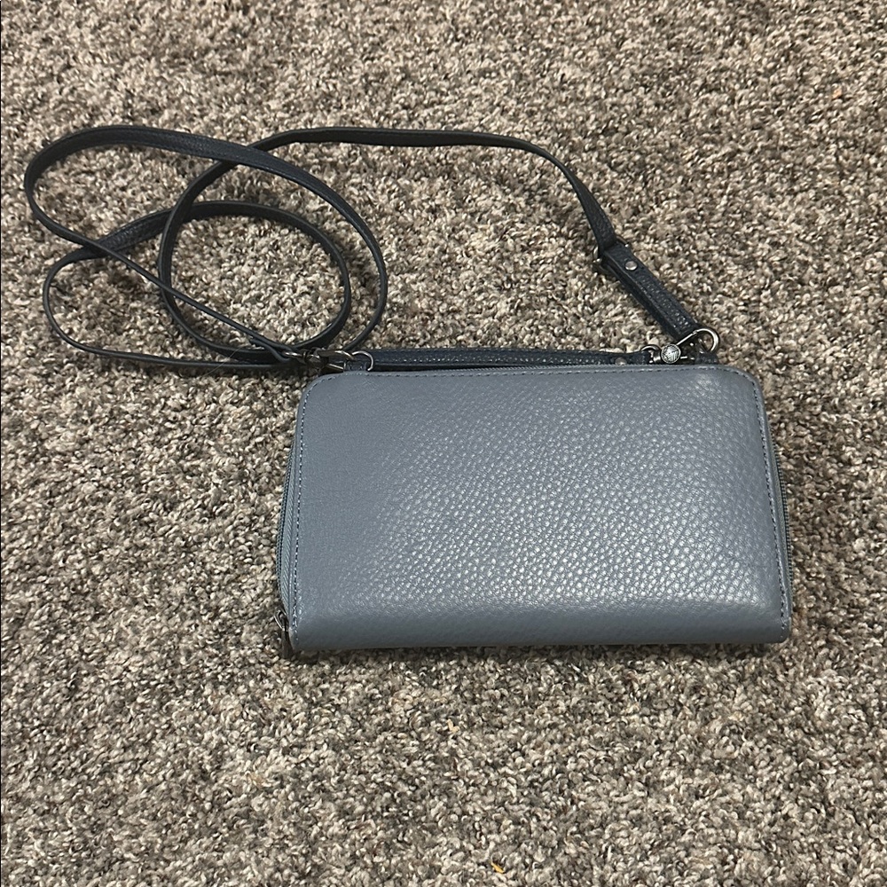 The Sak Iris crossbody wallet in dusty blue leather with navy and ivory trim. - Picture 9 of 9